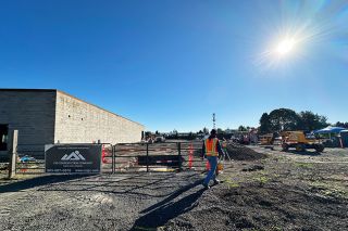 Rachel Thompson/News-Register##Work continues on the new Tractor Supply buildings, a $2.5 million project on Highway 99W at Booth Bend Road. The store sells items for farming and home gardens, pet care and other uses.