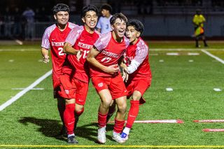 Nathan Ecker/News-Register##Left to right: Edwin Rodriguez, Abraham “Cruz” Cuevas-George, Fixx Siner and Edwin “Isai” Cuevas-George celebrate a goal by Siner in the Grizzlies victory over Forest Grove at Wortman Stadium on Thursday, Oct. 16. Mac players went wild for Siner, who scored his first goal as a Grizzly to cap Mac’s six-goal night. Nathan Ecker/News-Register##Left to right: Edwin Rodriguez, Abraham “Cruz” Cuevas-George, Fixx Siner and Edwin “Isai” Cuevas-George celebrate a goal by Siner in the Grizzlies victory over Forest Grove at Wortman Stadium on Thursday, Oct. 16. Mac players went wild for Siner, who scored his first goal as a Grizzly to cap Mac’s six-goal night.