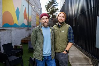 Rachel Thompson/News-Register##Danny and Lee McCollins stand in the space that will become Berry Creek Garden’s retail location, the courtyard behind Mac Market in McMinnville. The couple will raise and sell native plants along with specimens that thrive with the right care, Lee said. They hope to open Berry Creek in March. Rachel Thompson/News-Register##Danny and Lee McCollins stand in the space that will become Berry Creek Garden’s retail location, the courtyard behind Mac Market in McMinnville. The couple will raise and sell native plants along with specimens that thrive with the right care, Lee said. They hope to open Berry Creek in March.