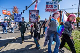 Rachel Thompson/News-Register##Protesters march southwest along Highway 99W in McMinnville on Saturday during the “No Kings” demonstration organized by Progressive Yamhill. It began with a gathering at Wortman Park and continued to the public library, where participants joined a larger crowd for a peaceful protest. Organizers estimated attendance between 1,000 and 1,500, calling it the largest demonstration they’ve held. Rachel Thompson/News-Register##Protesters march southwest along Highway 99W in McMinnville on Saturday during the “No Kings” demonstration organized by Progressive Yamhill. It began with a gathering at Wortman Park and continued to the public library, where participants joined a larger crowd for a peaceful protest. Organizers estimated attendance between 1,000 and 1,500, calling it the largest demonstration they’ve held.