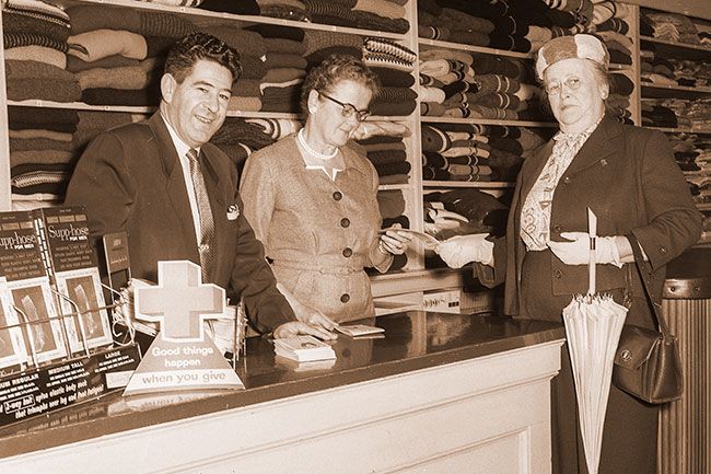 ##(Oct. 28, 1960) First Mac Stamps  to be redeemed were those turned in this week to Hamblin-Wheeler by Mrs. Clara Williams of 809 N. Evans Street, McMinnville. Shown receiving the books are Loretta Wheeler and Al Beeler, owners of the firm. Mrs. Williams received the stamps after purchasing a refrigerator-freezer from Miller Electric Company in McMinnville. Both firms give the new MAC stamps and are redemption centers for the stamp booklets. ##(Oct. 28, 1960) First Mac Stamps  to be redeemed were those turned in this week to Hamblin-Wheeler by Mrs. Clara Williams of 809 N. Evans Street, McMinnville. Shown receiving the books are Loretta Wheeler and Al Beeler, owners of the firm. Mrs. Williams received the stamps after purchasing a refrigerator-freezer from Miller Electric Company in McMinnville. Both firms give the new MAC stamps and are redemption centers for the stamp booklets.