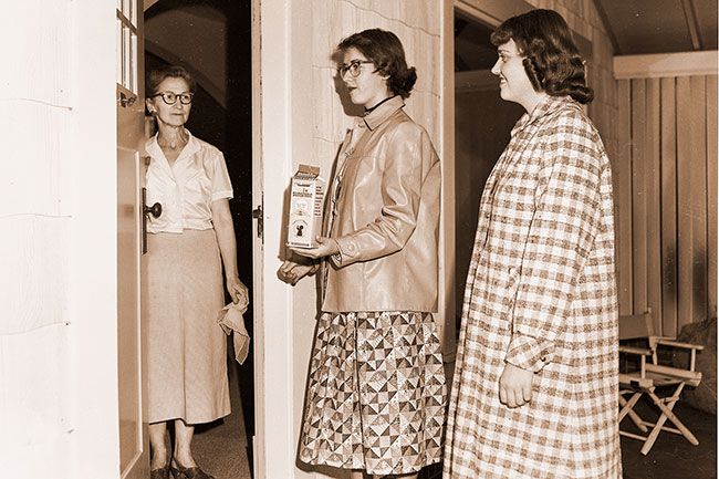 ##(Oct. 29, 1955) It’ll be a treat for underprivileged, starving, disease-ridden children the world over when McMinnville high school students join in a “trick-or-treat” good turn for UNICEF Sunday night as a Hallowe’en prelude. Students will be canvassing the city Sunday night asking local residents to share their health and happiness with all the world’s children in the United Nations Children’s Fund. Greta Nightengale (right) and Louise Riley practice their UNICEF solicitation technique on Mrs. K. A. Hartzell, 1243 Evans St. in this pre-Hallowe’en round. ##(Oct. 29, 1955) It’ll be a treat for underprivileged, starving, disease-ridden children the world over when McMinnville high school students join in a “trick-or-treat” good turn for UNICEF Sunday night as a Hallowe’en prelude. Students will be canvassing the city Sunday night asking local residents to share their health and happiness with all the world’s children in the United Nations Children’s Fund. Greta Nightengale (right) and Louise Riley practice their UNICEF solicitation technique on Mrs. K. A. Hartzell, 1243 Evans St. in this pre-Hallowe’en round.