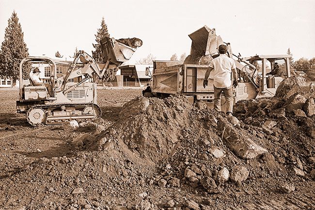 ##(Oct. 27, 1980) Bulldozers clear the 3.1-acre former site of the old junior high school that will be turned into “Baker Street Square.” Mark  Zimel of Mercury Development, Portland, said the work going on now mainly is clearing out the old school basement. The ground will be recompacted to handle the stress of the new building, he said. Financing negotiations continue for the center, with no final timetable established for construction of a Shari’s Restaurant, a new Bob’s Thriftway and other stores. ##(Oct. 27, 1980) Bulldozers clear the 3.1-acre former site of the old junior high school that will be turned into “Baker Street Square.” Mark  Zimel of Mercury Development, Portland, said the work going on now mainly is clearing out the old school basement. The ground will be recompacted to handle the stress of the new building, he said. Financing negotiations continue for the center, with no final timetable established for construction of a Shari’s Restaurant, a new Bob’s Thriftway and other stores.