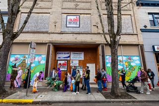 Rachel Thompson/News-Register##The 3rd Street Pizza building, seen during the trick-or-treating event on Halloween, is for sale for $950,000. The space has been empty since a May 2023 fire, but extensive renovation work has been completed.