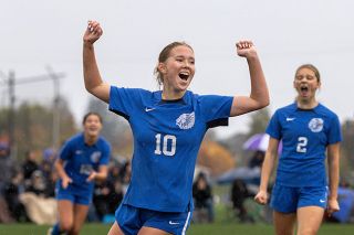 Rachel Thompson/News-Register##Adie Nisly celebrates one of her three goals against Lost River/Bonanza on Tuesday, Nov. 4 at Amity High School.