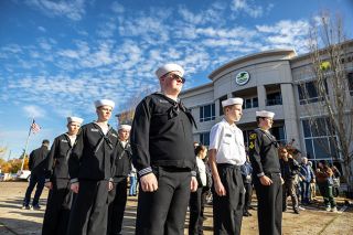 Rachel Thompson/News-Register##Members of the U.S. Naval Sea Cadet Corps Iron Side Division, based in McMinnville, stand at attention in front of the Yamhill County Government Services Building following Saturday’s Veterans Day Parade.