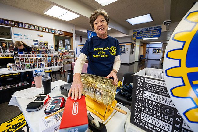 Rachel Thompson/News-Register##Leila Thompson of the Rotary Club of the West Valley prepares the raffle drum for prize drawings during the expo. Hosted by the Rotary Club for its second year, the free event featured vendors, gaming tournaments and a raffle for a Nintendo Switch 2. Organizers said last year&rsquo;s event saw limited youth turnout, largely due to the cost of entry. In response, local businesses stepped in to sponsor participants this year, covering entry fees and T-shirts. &ldquo;We&rsquo;re trying to actually get the whole valley included,&rdquo; said Rotary member Matthew Hugeli. &ldquo;We&rsquo;d love to get Dallas, McMinnville, Willamina to participate. We&rsquo;d love to make this a big thing.&rdquo;