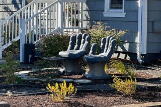 Kirby Neumann-Rea/News-Register##Hands seem to reach up and invite one — or two — to rest.