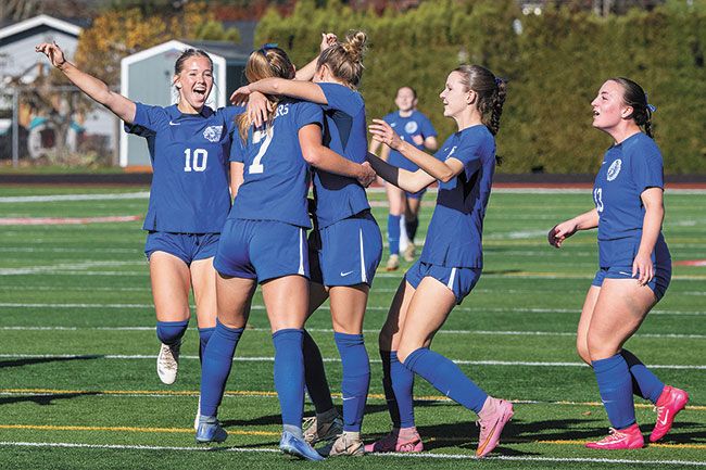 Rusty Rae/News-Register##Adie Nisly (No. 10) runs to celebrate her sister Eliza (No. 7) and other teammates after Eliza&rsquo;s game deciding goal in the first half of their semifinal match against Creswell on Nov. 11 at Wortman Stadium.