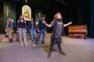 Rachel Thompson/News-Register##Gladys Herdman (Elly Bergum) delivers one of her trademark outbursts as her siblings — Claude (Clark Olson), Imogene (Maya Strunk), Ralph (Carter Whitfield) and LeRoy (Julian Reyes-Ray) — listen in during a run-through of “The Best Christmas Pageant Ever” at Gallery Theater.