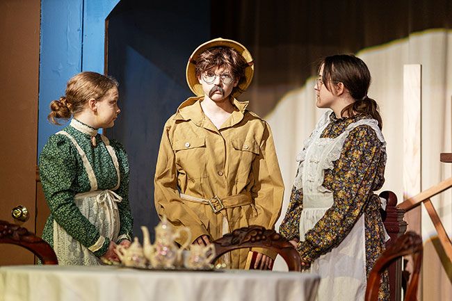 Rachel Thompson/News-Register## Aunts Martha Brewster (Carly Morris), left, and Abby Brewster (Lana Spenner) listen as Teddy Brewster (River Frisbee) explains one of his presidential notions in “Arsenic and Old Lace,” which runs Nov. 20-23.