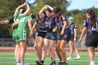Nathan Ecker/News-Register file photo##From left to right: Dayton High Schooler Kaylinray Pelletier and McMinnville students Ev Hane and Jericka Hoke prepare to scrum down against Summit during the Valley Panthers home tournament at Wortman Stadium on Saturday, Sept. 27. Pelletier and Hane represented the Panthers in Idaho for the 7s Championship.