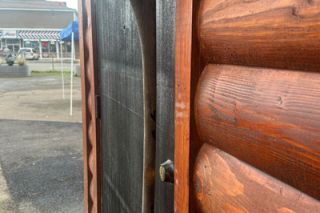 Kirby Neumann-Rea/News-Register##Ax and blade no longer open the door to the bar of Grand Ronde’s Bonanza, but are a permanent fixture.