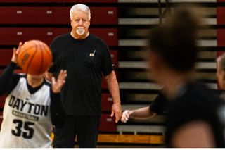 Nathan Ecker/News-Register##New Dayton head coach Bruce Moore watches as his players work on defensive and offensive strategy during a practice session at Dayton High School on Saturday, Nov. 22. Moore was ecstatic to return to coaching and has the intention of bringing winning basketball back to Dayton after a lull in success for the girls program.