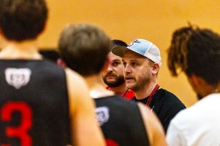 Nathan Ecker/News-Register##Mac boys Head Coach Tucker Coil addresses the team near the end of practice on Nov. 21. He preached energy, aggressiveness and team work in practices leading up to McMinnville’s opening week of games as Coil wants there to be no surprises when they hit the floor for games.