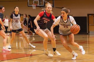 Nathan Ecker/News-Register##Freshman guard Cameron Baker drives past Terry on a layup attempt, showing how the team will look to attack the basket during the 2025-26 season. Baker is one of four freshmen, including Olivia Olsen, Maci Hendricks and Grace Carlson, suiting up for varsity. It marks the first time since 22-23 that Mac will have freshmen on the varsity roster. The last two were Brooklynn Summers and Ruby Riddle, who both now look forward to teaching the next generation as seniors.