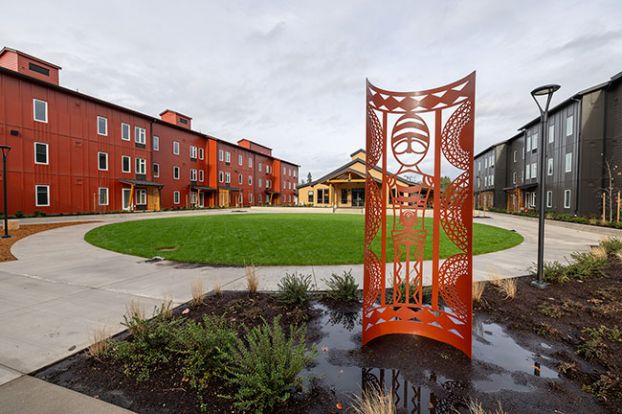 Rachel Thompson/News-Register##Grand Ronde artist Bobby Mercier created a metal sculpture for the courtyard at Stratus Village, the housing authority&rsquo;s new affordable housing complex near the hospital. The Confederated Tribes of Grand Ronde are partners in the project.