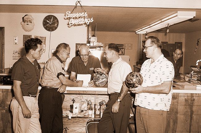 ##(Dec. 16, 1960) Going over plans for the McMinnville Bowling Association&rsquo;s 11th annual handicap City Tournament, are, from left to right, Bill Tackett, the top money winner last season; Lyle Gould, tournament manager; Arvid Ekman, proprietor of Walnut City Bowl; Dave Hall, secretary-treasurer of the MBA; and Dick Wilson, defending champion in the A division singles. The tourney is scheduled to run Dec. 26-30 at Walnut City Bowl and Newberg Bowl.