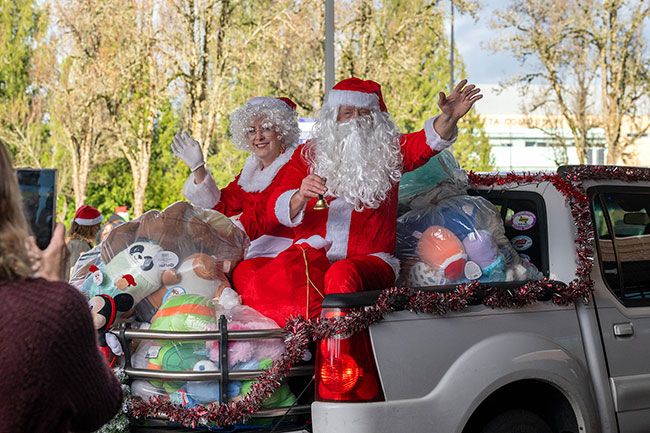 Rusty Rae/News-Register##Santa (Scott Johnson) and Mrs. Claus (Donna Lowe) arrive at Willamette Valley Medical Center bearing gifts from the BC Harleys group.