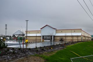 Rachel Thompson/News-Register##The new Tractor Supply store is taking shape at Booth Bend Road and Highway 99W in south McMinnville. The store will
sell items for livestock, agriculture, home improvement, pet
care and other projects. The $2.5 million project includes
two one-story buildings covering 21,930 square feet.