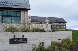 Ossie Bladine/News-Register##The Grange Estate Private Residence, background, was built in the Dundee Hills on the property that also includes the tasting room for The Four Graces and Anthology kitchen, foreground, and the Black Walnut Inn. The compound is owned by billionaire businessman and professional sports team owner Bill Foley.
