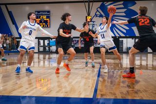 Rusty Rae/News-Register##Carter Haarsma runs toward the rim with the ball on a platter, ready to score in Amity&rsquo;s victory over the Bulldogs on Monday, Jan. 11 at the Warrior Gymnasium. Haarsma posted 18 points in the game, continuing a run of 15-plus point performances over Amity&rsquo;s recent games.