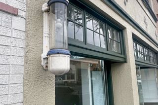 Kirby Neumann-Rea/News-Register##Antiquated barbershop sign, stripped of its stripes, in Newberg.