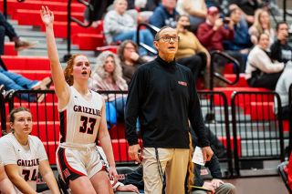 Rusty Rae/News-Register## Brooklyn Summers and Sean Coste hold their breath, watching a 3-point attempt soar toward the rim. The Grizzlies went 1-for-10 from the arc and 10-for-40 from the field, marking a tough shooting night as they battled several hot-hands from Sherwood.