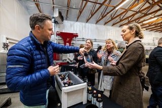 Rachel Thompson/News-Register##Matt Thomas, founder of Brew Dr. Kombucha, pours the fizzy, probiotic tea for guests at the Sip & Savor non-alcoholic wine event at Brooks Wine Saturday, Jan. 10. Samplers, from left, are Sarah Senn, Michele Margherita and Brittany Wooten, all from Portland. They were among about 50 people who came to Brooks, near Amity, for the first of four conferences about non-alcoholic beverages, including wine, beer and spirits.