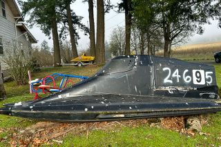 Kirby Neumann-Rea/News-Register##Tunnel boats in a North Valley Road yard, including the yellow &ldquo;Team Grandpa.&rdquo;