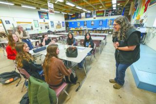 Rachel Thompson/News-Register##Patton Middle School STEM teacher Michele Reschly, right, congratulates the Space Whale team of students who were chosen to create an experiment for NASA Flights. Students, seated clockwise from bottom center, include Addie Patton, Miriam Schultz, Eleanora Bent, Joss Dossey, Leslie Grimaldo and Aimee Contreras. Assistant Principal Lisa Jordan-Zornow stands at left.