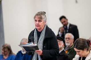 Rusty Rae/News-Register##At the Merkley town hall, Sheila Mariagh asks the senator, pictured below, what he thinks of current Democrat leadership. He noted that new leaders will be chosen in January 2027.