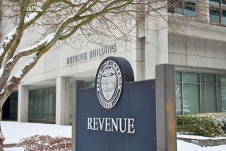 Alan Cohen/Oregon Capital Chronicle
The Oregon Department of Revenue building in Salem on Thursday, Feb. 13, 2025. Lawmakers will begin 2026 with $300 million more than expected for the state&rsquo;s budget, state economists reported.