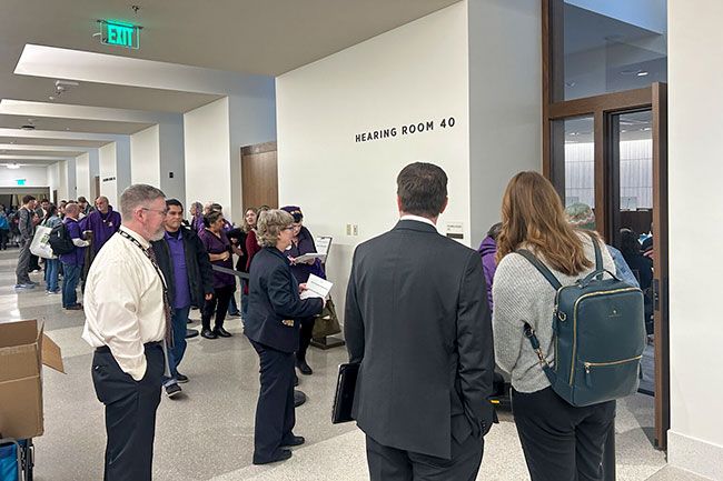 Mia Maldonado/Oregon Capital Chronicle##A crowd lines up to attend a public hearing of the Oregon Legislature&rsquo;s Joint Ways and Means Committee.