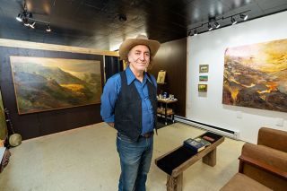 Rachel Thompson/News-Register##Jody Carroll in his new art gallery in Lafayette, which features his own work. Carroll, also a musician, said he wants the gallery at 380 Third St. to be a music venue, as well.