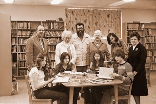 ##(Feb. 11, 1976) With money from their annual greens sale at Christmas, McMinnville Garden Club, in conjunction with a nation-wide project, purchased 29 sets of &ldquo;People and Their Environment,&rdquo; a teachers&rsquo; curriculum guide to conservation education, for School District 40. Guides include curriculum aimed at first through twelfth grades. Pictured are, standing from left, Orval Ause, superintendent; Lucille Floyd, garden club conservation chairwoman; Don Boudon, district outdoor program head; Ruby Wilson, garden club president; Ron Pridemore, junior high student; Blanche Wold, garden club program chairwoman. Seated are junior high students, from left, Roberta Kiplinger, Kathy Clark, Marla Reed and Ken Williams.