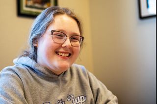 Rusty Rae/News-Register##Amity High School graduate Jamie Shevchenko, currently a Linfield University sophomore, spent fall semester in England thanks, in part, to the McMinnville Soroptimist organization. Club members stepped in after the international business major&rsquo;s car was ransacked and her laptop and other necessities stolen. Shevchenko said she loved her time at Liverpool University and had a chance to travel to Scotland and Italy, as well.