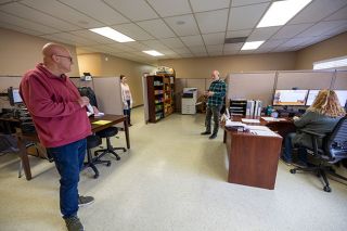 Rachel Thompson/News-Register##Dayton city employees, from left, Dave Rucklos, Rocio Vargas, Rob Walker and Ricci Haworth talk in their new office space in the annex building,
