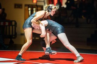 Rachel Thompson/News-Register file photo##Tayah Curry holds back  Sherwood freshman Hadara Gerr during the Mac/Sherwood duals at MHS on Thursday, Feb. 5. Curry defeated Gurr via pin in 1:37. On Feb. 14, Curry became on of two Grizzlies to earn a state berth.