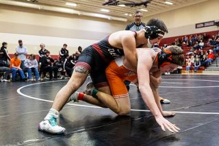 Rachel Thompson/News-Register file photo##Dayton&rsquo;s Alejandro Magana gets atop Yamhill Carlton&rsquo;s Tyler Pond during a dual meet at Dayton High School on Feb. 4. Both local beats will compete for a state title at Veterans Memorial Coliseum in Portland on Feb. 26-27.