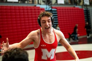 Rusty Rae/News-Register##McMinnville s Christopher Steadman is pumped up after a win over Newberg s Dane Wilson.