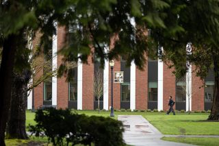Rachel Thompson/News-Register##A student walks past the Keck Science Center on the Linfield University campus. A nationwide drop in high school graduates has impacted the school&rsquo;s enrollment numbers.