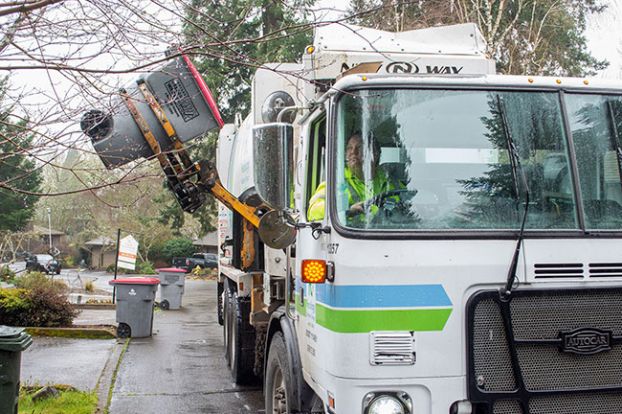 Ossie Bladine/News-Register##Recology Western Oregon driver Farrah Welland monitors as a recycling cart is dumped from the Shadowood neighborhood in McMinnville. Part of Oregon&rsquo;s new Recycling Modernization Act is a universal collection list, so the list of materials accepted in curbside recycling will be the same everywhere in the state.