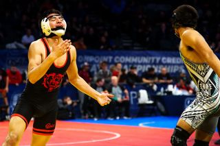 Nathan Ecker/News-Register##Grizzly senior Nelson Campos celebrates with some relief after beating out Century&rsquo;s Samuel Gomez in an overtime dual to advance to consolation round five of the 6A boys 138-pound bracket at Veterans Memorial Coliseum on Feb. 28. It was their third meeting of the season and Campos got the upper hand with a perfectly timed pounce on Gomez s ankles as the Jaguar tried to shuffle away.
