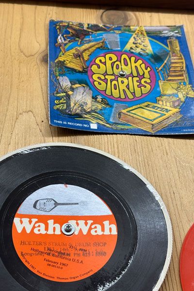 Kirby Neumann-Rea/News-Register##The unusual &ldquo;Wah Wah&rdquo; recording, and &ldquo;Spooky Stories,&rdquo; a book of Latin shown on the disc, issued in a 1978 magazine.