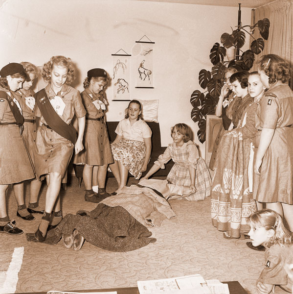 ##(March 10, 1961) Fifth graders in the McMinnville Girl Scout troop practice artificial respiration as a part of their learning rescue techniques for a variety of emergency situations. Leaders of the troop are Mrs. Chris Horn and Mrs. Milt Robins. Girl Scout Week, March 12-18, will give Girl Scouts in the county and their leaders an opportunity to show what they can do to serve their community. ##(March 10, 1961) Fifth graders in the McMinnville Girl Scout troop practice artificial respiration as a part of their learning rescue techniques for a variety of emergency situations. Leaders of the troop are Mrs. Chris Horn and Mrs. Milt Robins. Girl Scout Week, March 12-18, will give Girl Scouts in the county and their leaders an opportunity to show what they can do to serve their community.