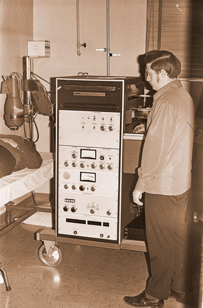 ##(March 13, 1971) First use in Yamhill County of a mobile diagnostic machine which uses radioactive isotopes was this week at Physicians’ Medical Center. Technician Steve Bernard watches “scanner” working. Doctors previously had to send patients to Portland or Salem for such diagnoses. Mobile machine will help save time and money and, in some cases, lives, officials say. ##(March 13, 1971) First use in Yamhill County of a mobile diagnostic machine which uses radioactive isotopes was this week at Physicians’ Medical Center. Technician Steve Bernard watches “scanner” working. Doctors previously had to send patients to Portland or Salem for such diagnoses. Mobile machine will help save time and money and, in some cases, lives, officials say.