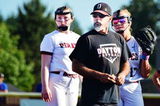 Rachel Thompson/News-Register file photo##Rylie Hedgecock (left), Frank Baumholtz (center) and Charly Upmeyer (right) look toward their home dugout during their 5-4 semifinal win over Yamhill Carlton on June 3, 2025. This season, having graduated leaders like Hedgecock and Lillie Brooks, the Pirates shift their gaze to younger roster whose championship experience may pay dividends.