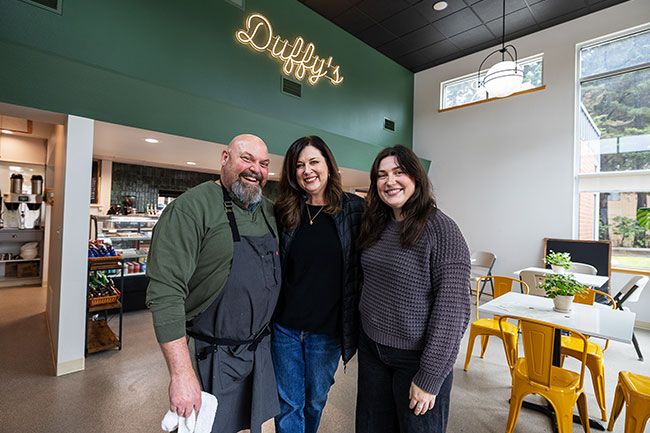Rachel Thompson/News-Register##Doug and Kelly Kizer and their daughter, Delaney, right, want the new Duffy&rsquo;s Deli & Coffee to reflect Kelly&rsquo;s Irish heritage and the coffee shops she and Doug loved in New York City, where they met.