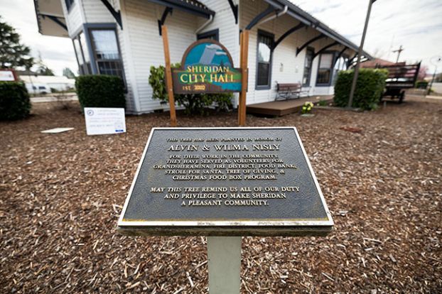 Rachel Thompson/News-Register## tree will soon be planted to recognize Alvin and Wilma Nisly&rsquo;s community service as part of the Sheridan City Hall&rsquo;s new landscaping. The improvement is part of the city&rsquo;s wider mission of becoming a pollinator paradise and home to native vegetation. Local permaculture farm Treedemption Gardens will plant and maintain the landscape for the first year.